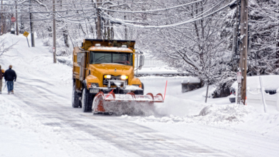 Snow plow clearing roads from snow