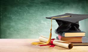 Graduate cap, tassle, diploma and books